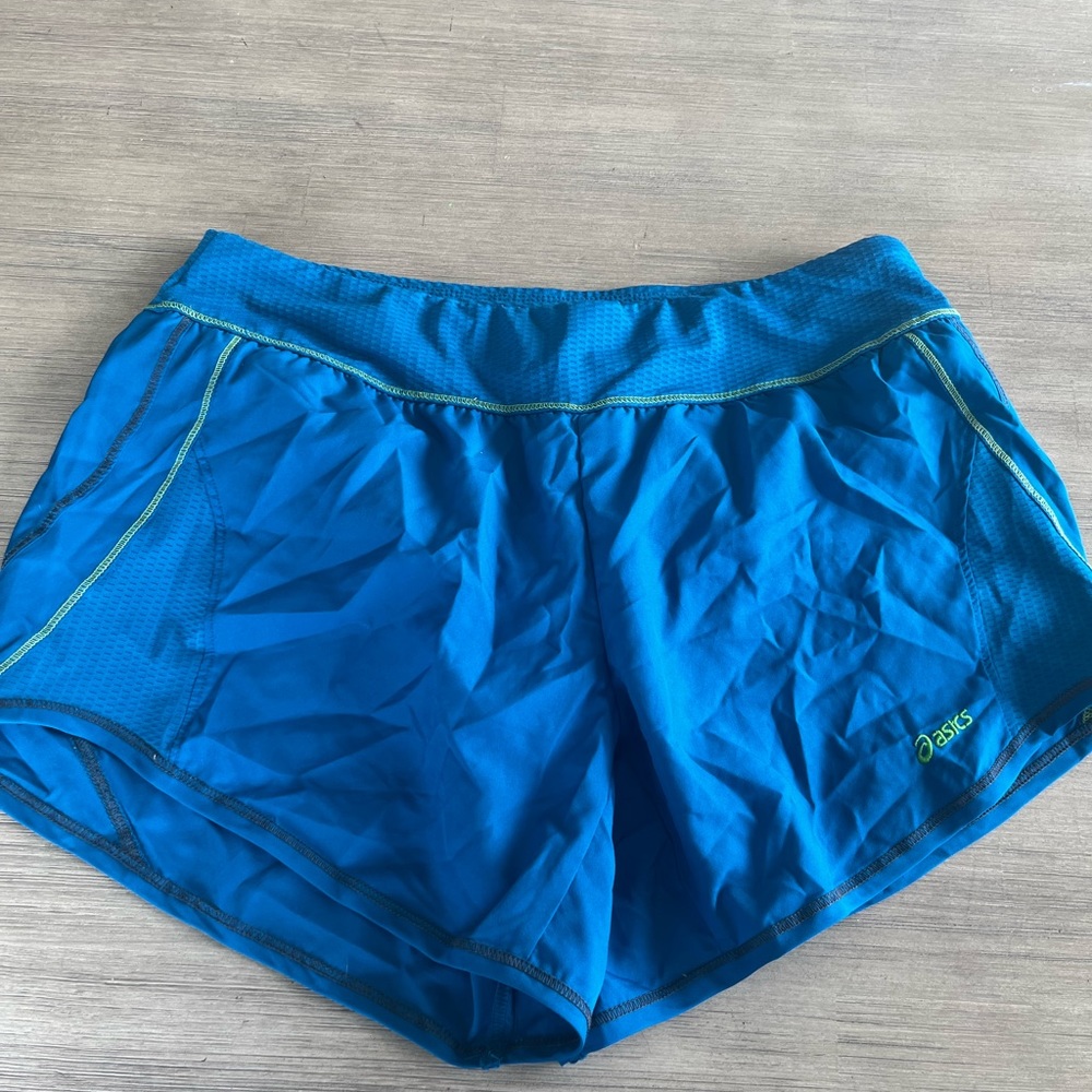 Asics athletic shorts. Size medium. 2.5 inseam. Excellent condition.